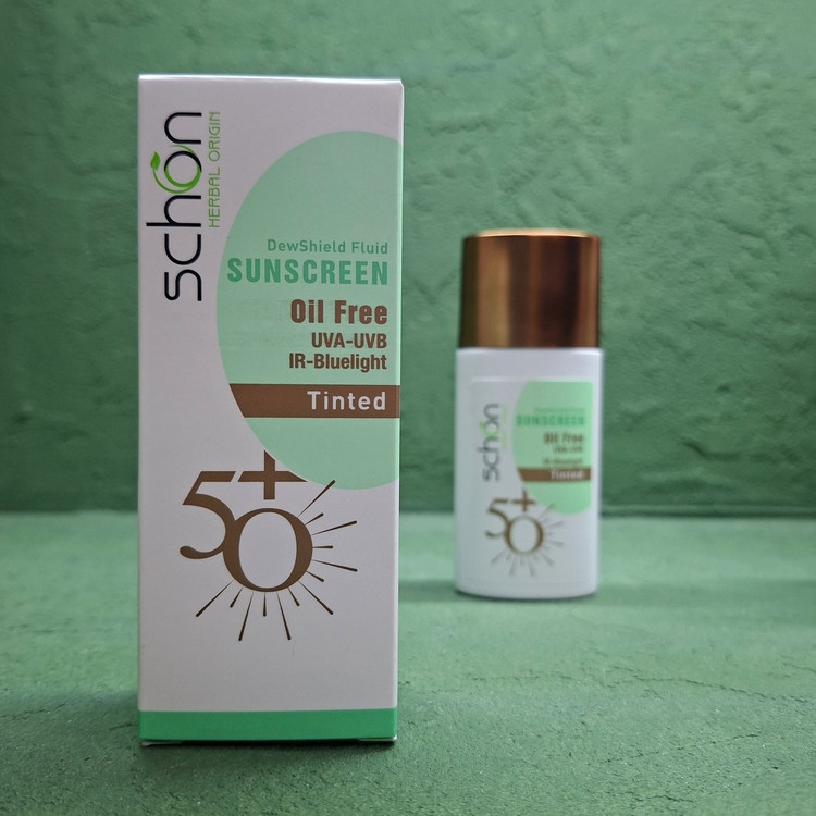 ضد آفتاب فلوئید رنگی شون مدل Dew Shield با SPF 50 حجم 50 میلی لیتر